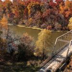 Fall colors and bridge over Crawfish River at Astico Park Columbus Wisconsin