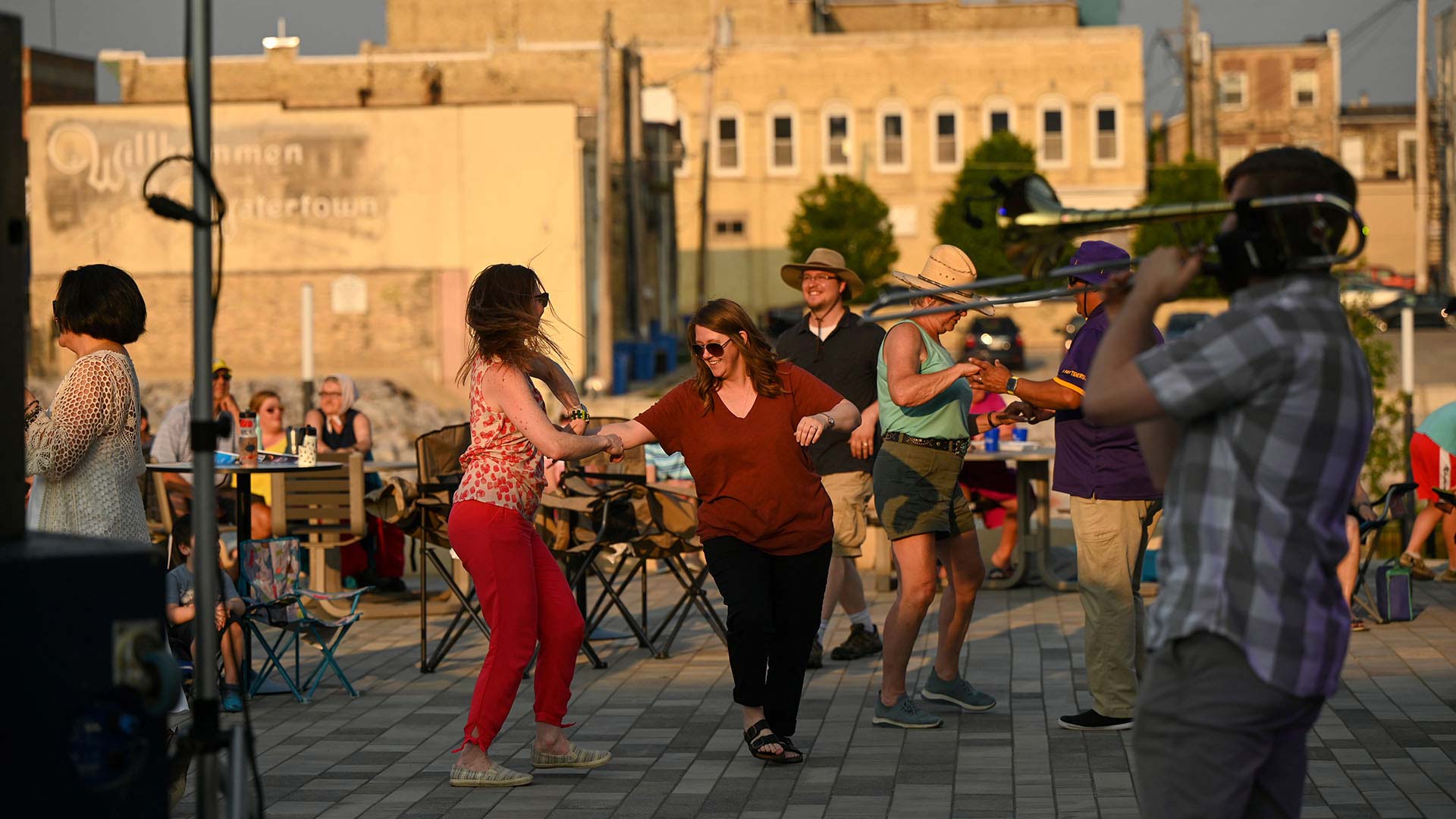 People dancing at concert at Bentzin Family Town Square in downtown Watertown WI