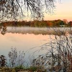 Fog on Sinissippi Lake in fall Hustisford Wisconsin