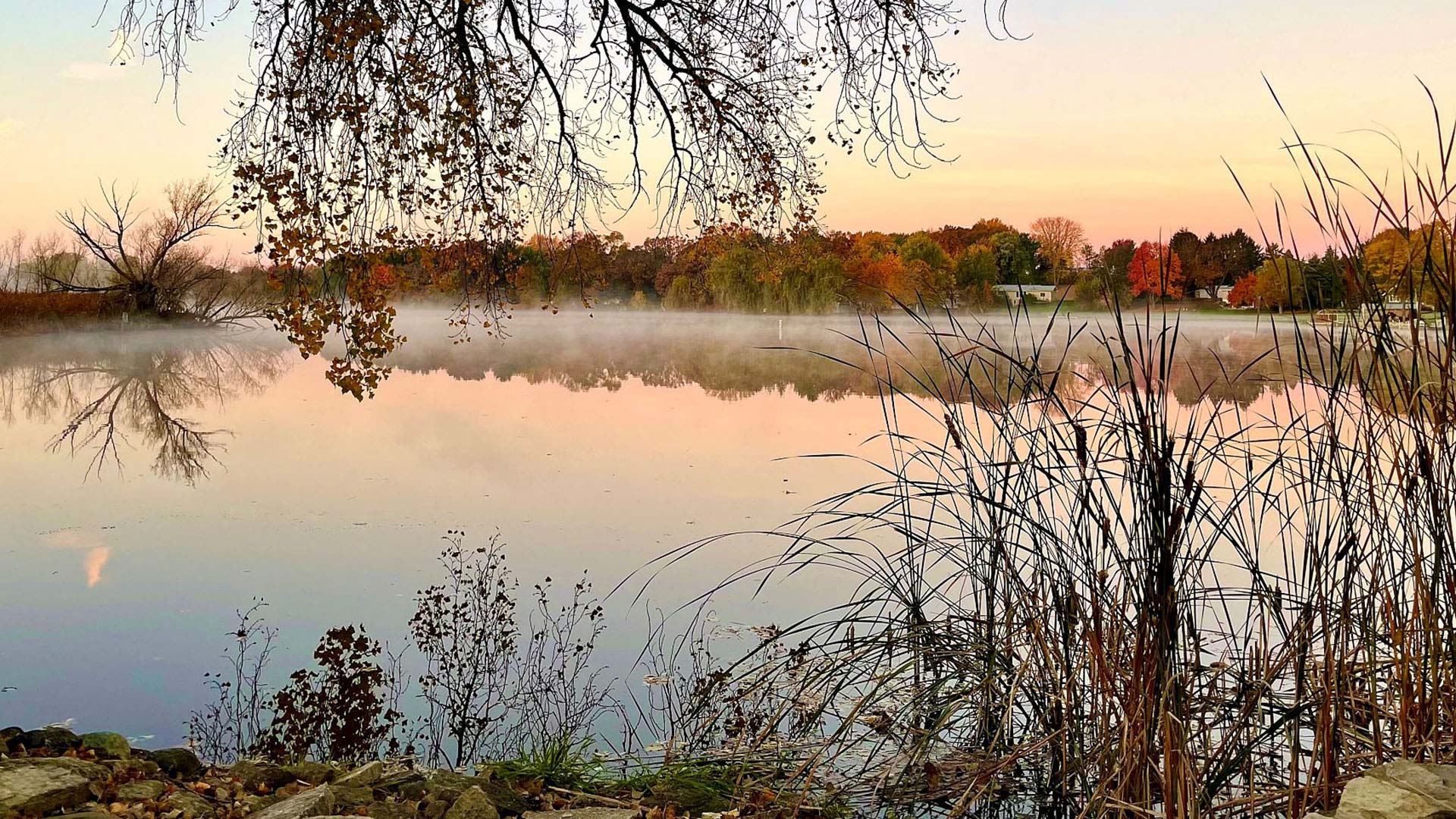 Fog on Sinissippi Lake in fall Hustisford Wisconsin