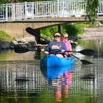 Women kayaking at Riverside Park in Watertown Wisconsin