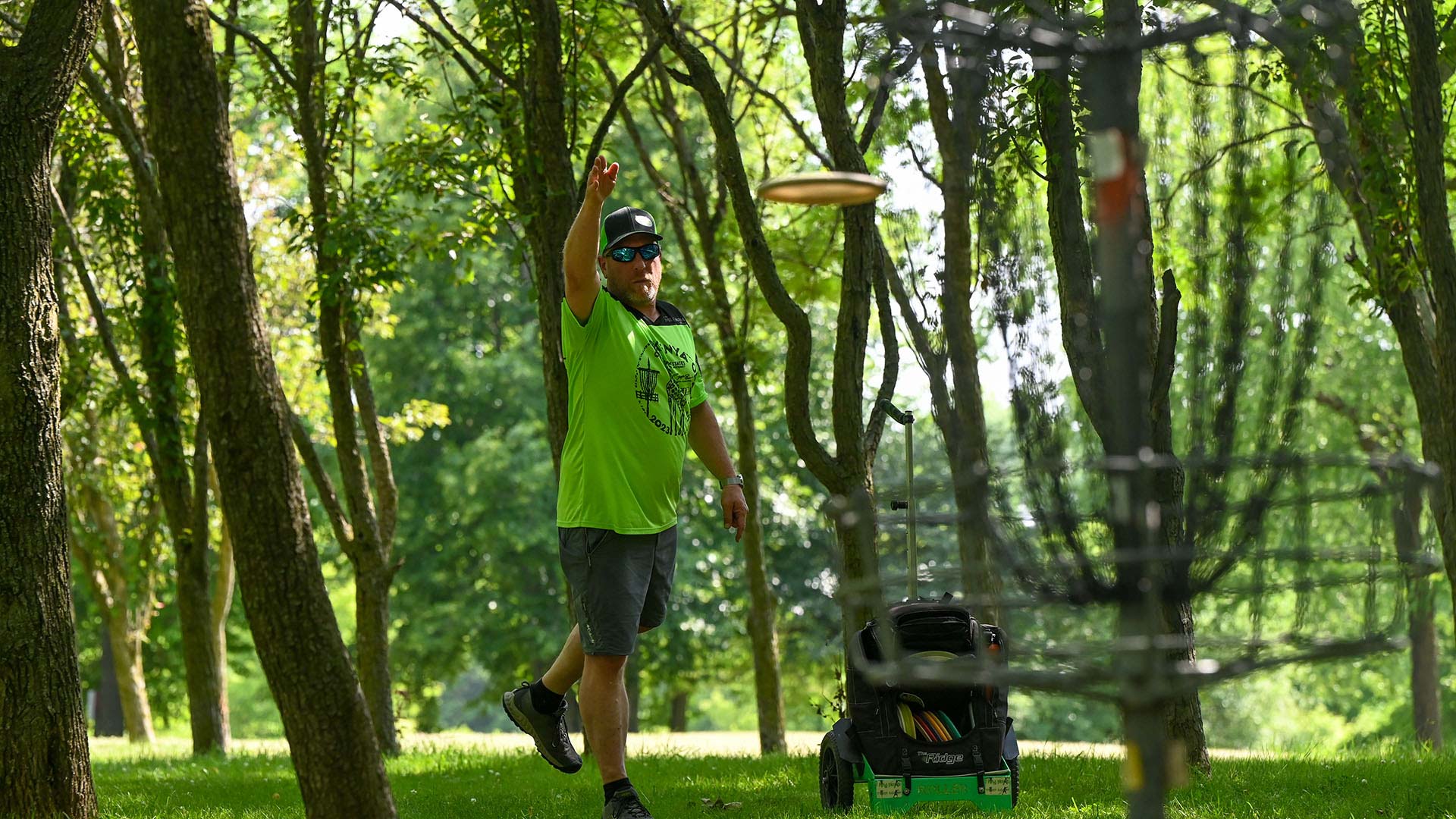 Man disc golfing at Brand-Quirk Park in Watertown Wisconsin