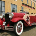 Classic car parked outside Wisconsin Automotive Museum in Hartford