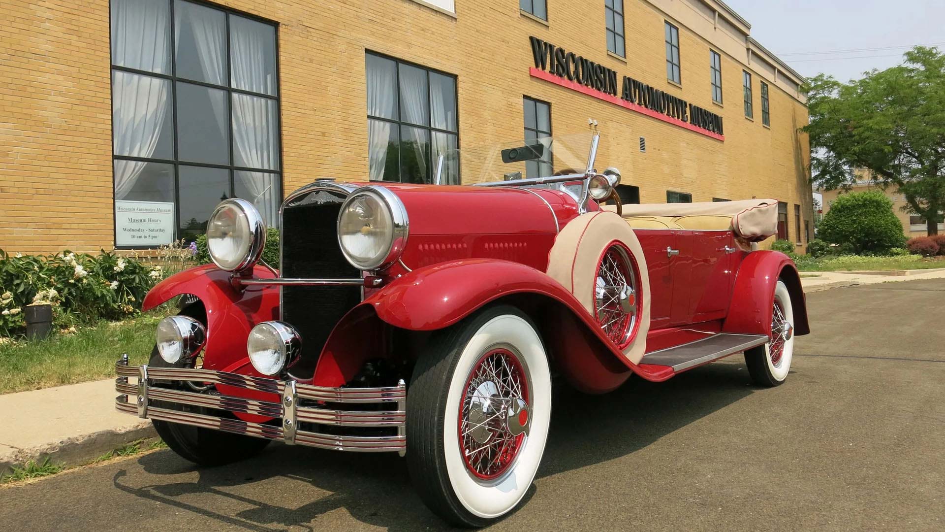 Classic car parked outside Wisconsin Automotive Museum in Hartford
