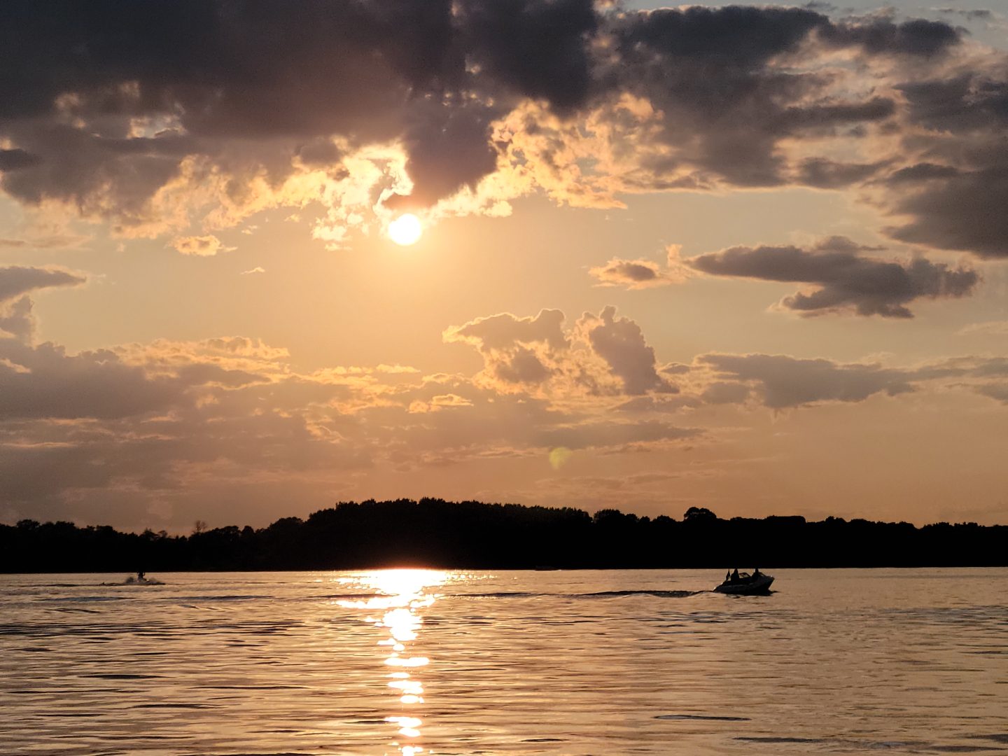Boat on Lake Sinissippi at sunset