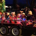 Children on a Christmas themed float during parade