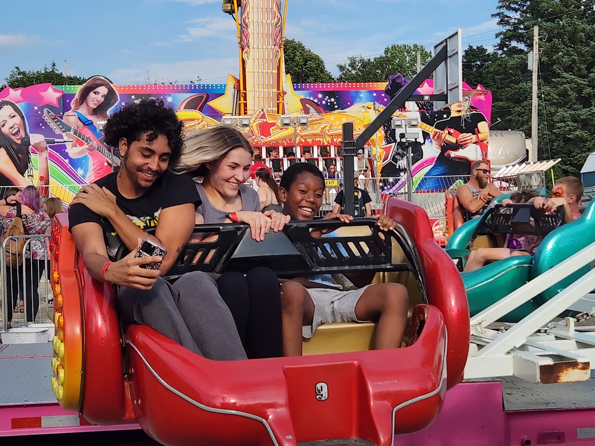 People having fun on an amusement park ride