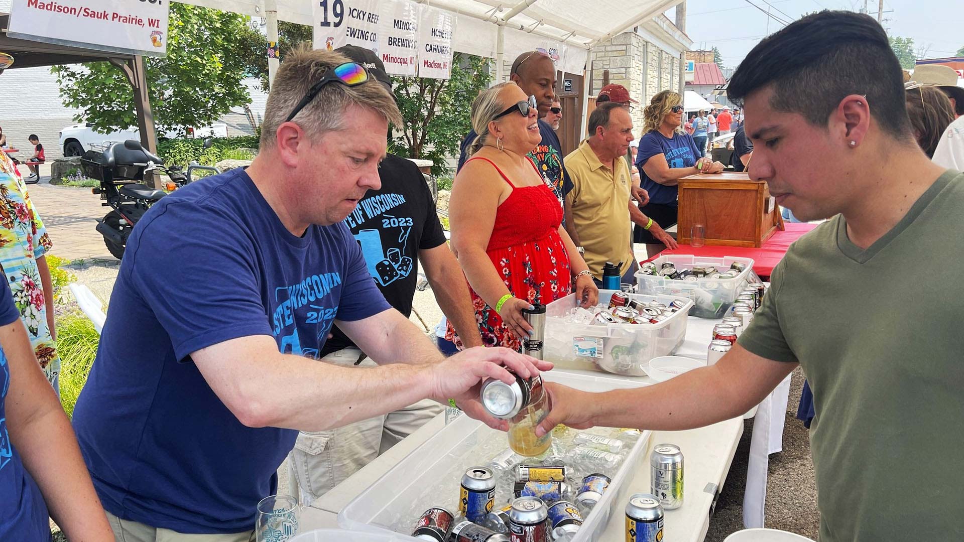 Man buying beer at Taste of Wisconsin beer festival in Beaver Dam WI
